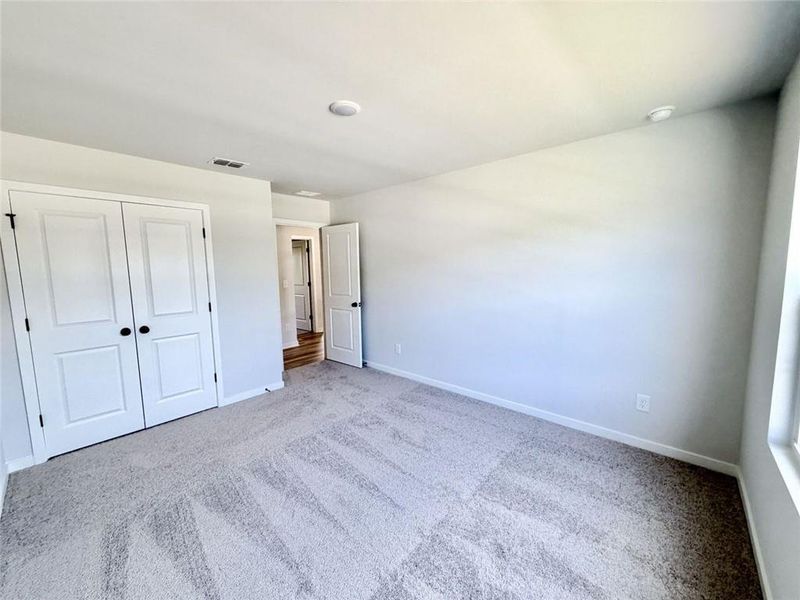 Spacious, unfurnished interior of a new home in Windsong Estates, McDonough (Image 16).