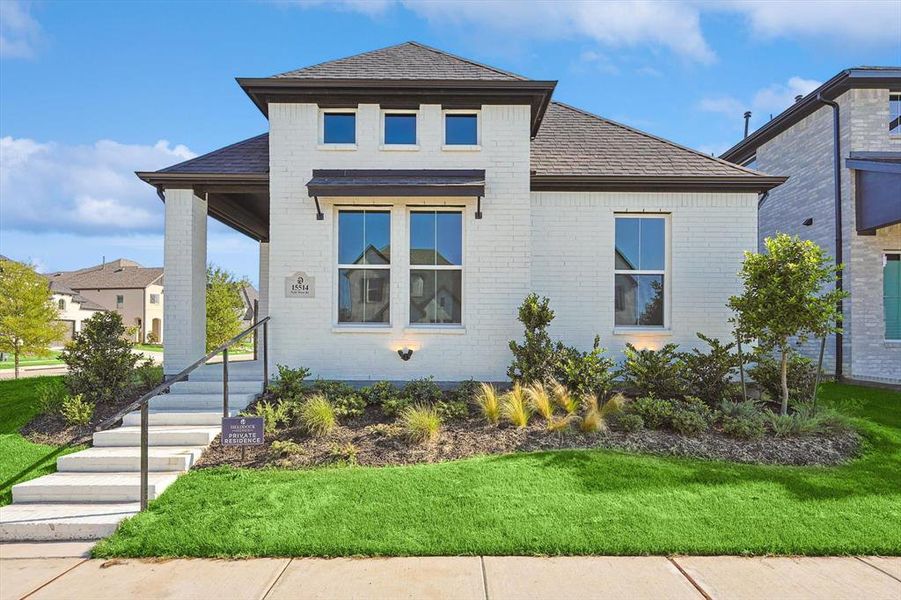 View of front of home featuring a front yard