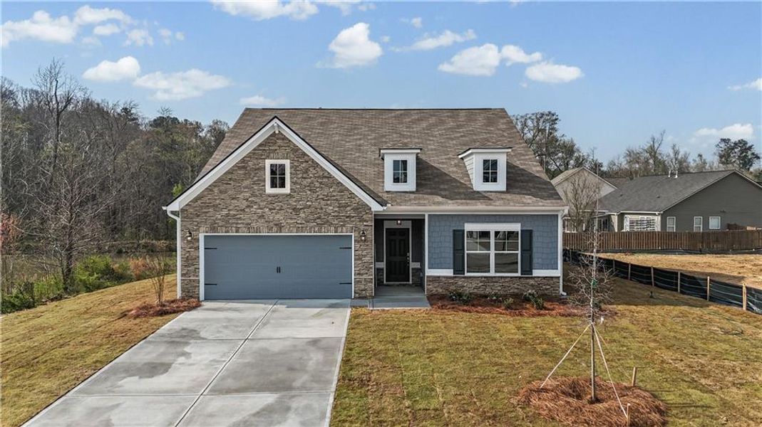 Front exterior of a new home in Maple Village, Adairsville, GA, highlighting curb appeal (Image 22).