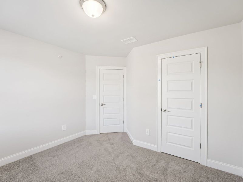 Spacious, unfurnished interior of a new home in Hemingway - Highland Series, Cumming (Image 17).
