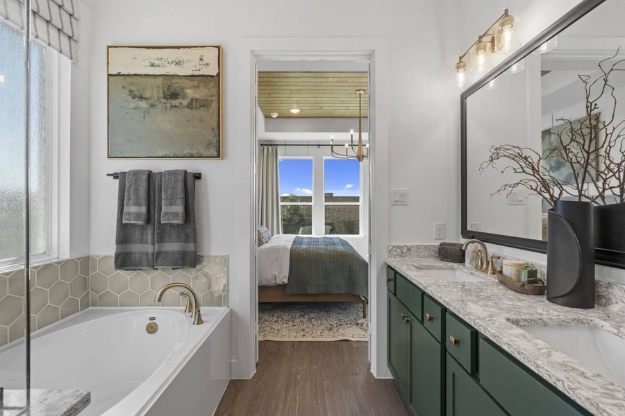 Representative furnished interior of a home built from the Aubrey by Chesmar Homes in Sienna, Missouri City (Image 46).
