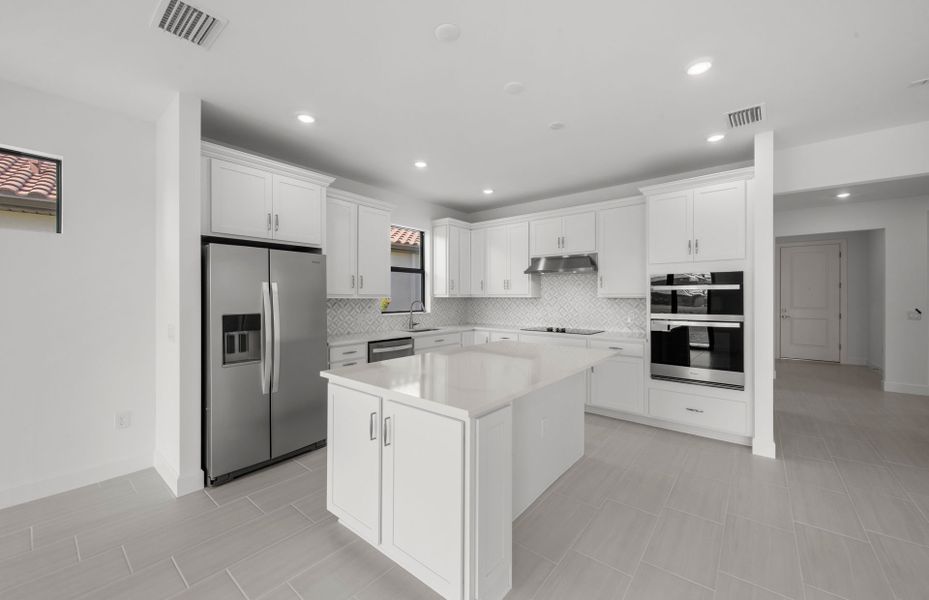 Chef-inspired kitchen with designer finishes