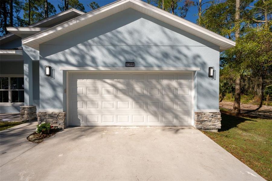 Front exterior of a new home in , Deland, FL, highlighting curb appeal (Image 26).