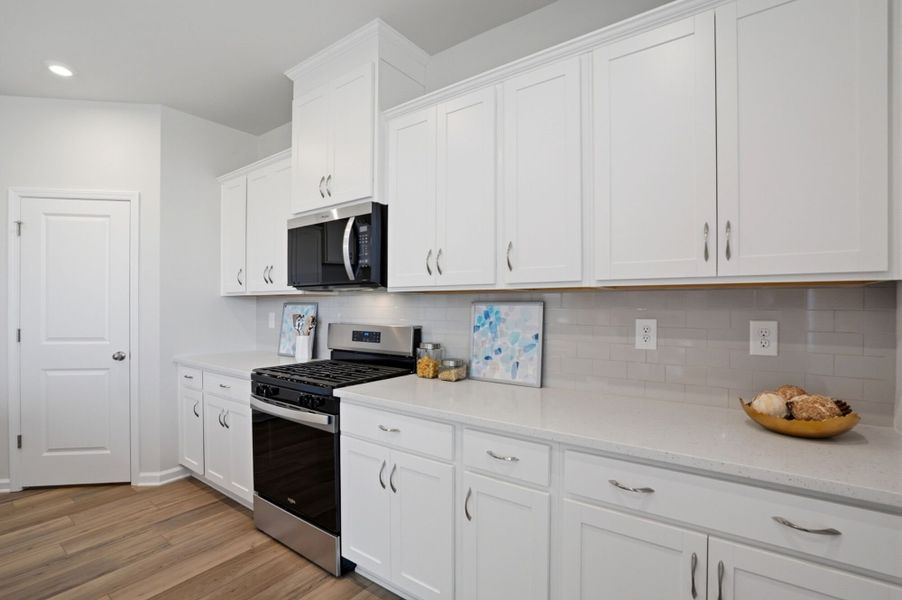 Furnished interior view inside a new home in Waxhaw Landing, Monroe (Image 15).