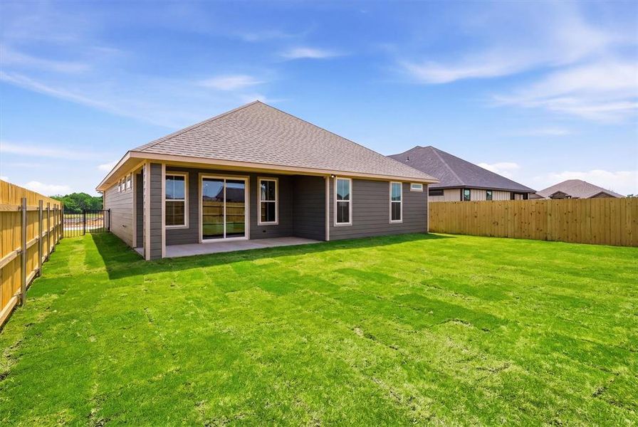 Exterior details and patio area of a home in , Tolar (Image 3).
