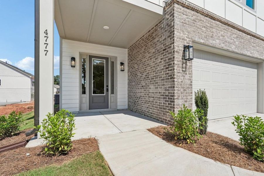 Exterior details and patio area of a home in The Preserve at Killian Hill, Lilburn (Image 3).