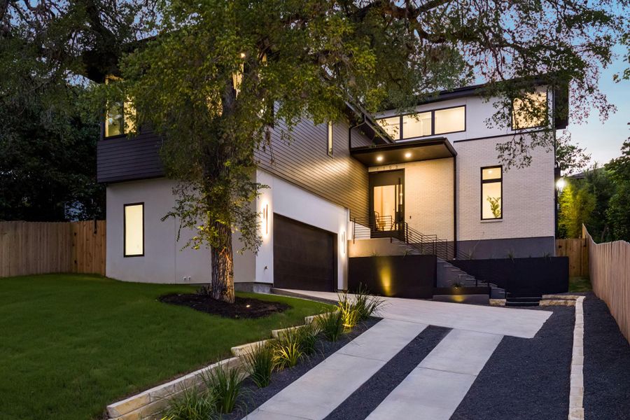 Front exterior of a new home in , Austin, TX, highlighting curb appeal (Image 1). Front exterior of a new home in , Austin, TX, highlighting curb appeal (Image 1).