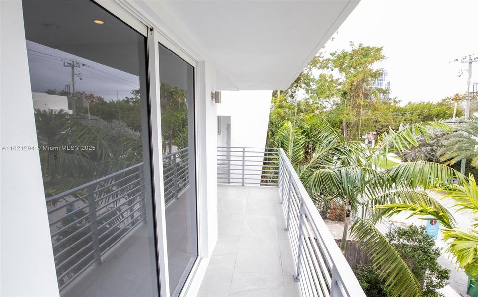 Exterior details and patio area of a home in , Miami (Image 2).