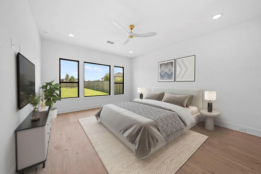 *Virtual Staging* Spacious primary bedroom offering a comfortable layout, natural light, and contemporary finishes.