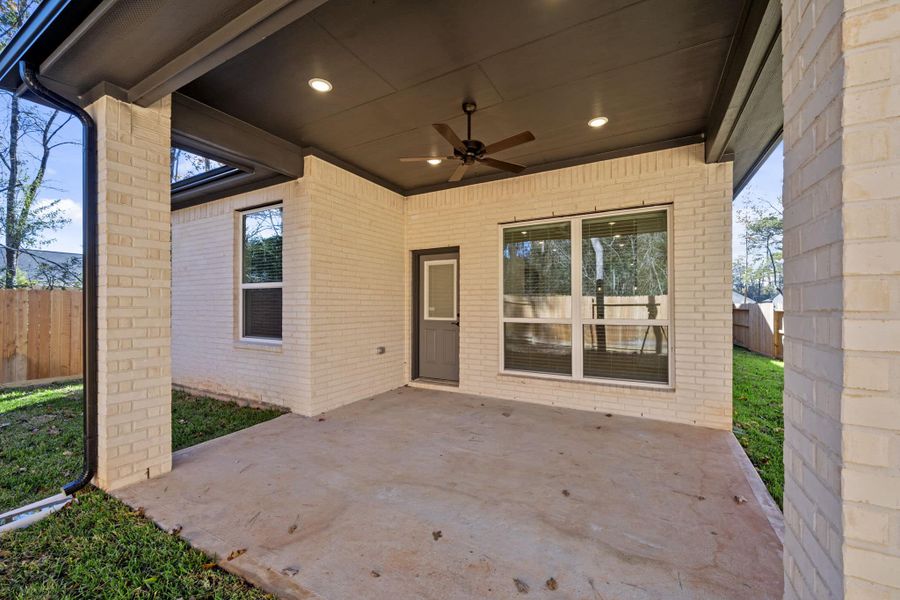 Exterior details and patio area of a home in The Woodlands Hills, Willis (Image 4). Exterior details and patio area of a home in The Woodlands Hills, Willis (Image 4).