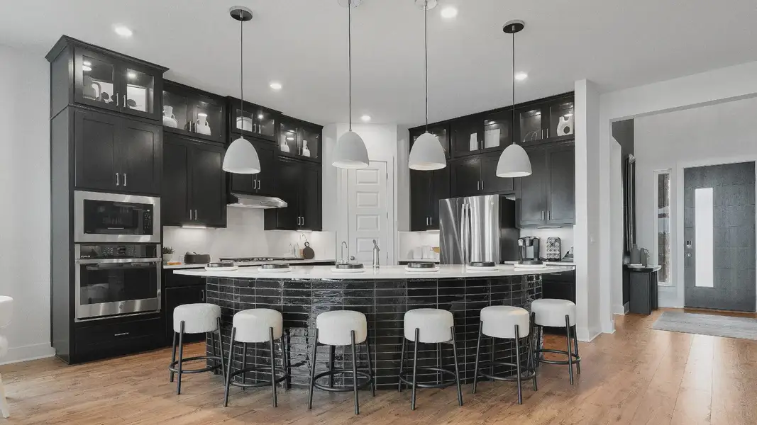 Representative furnished interior of a home built from the Maddy by Chesmar Homes in Santa Rita Ranch, Liberty Hill (Image 5).