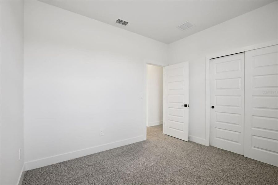 Spacious, unfurnished interior of a new home in Magnolia Bay - Reserve Series, Nokomis (Image 28).