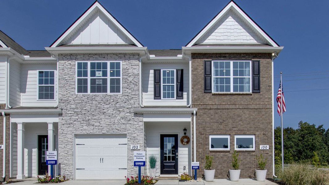 Front exterior of a new home in King's Landing, Lewisburg, TN, highlighting curb appeal (Image 2). Front exterior of a new home in King's Landing, Lewisburg, TN, highlighting curb appeal (Image 2).