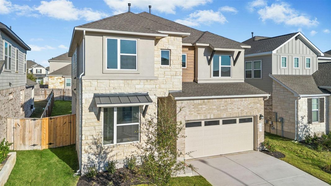 Front exterior of a new home in University Heights, Round Rock, TX, highlighting curb appeal (Image 19). Front exterior of a new home in University Heights, Round Rock, TX, highlighting curb appeal (Image 19).
