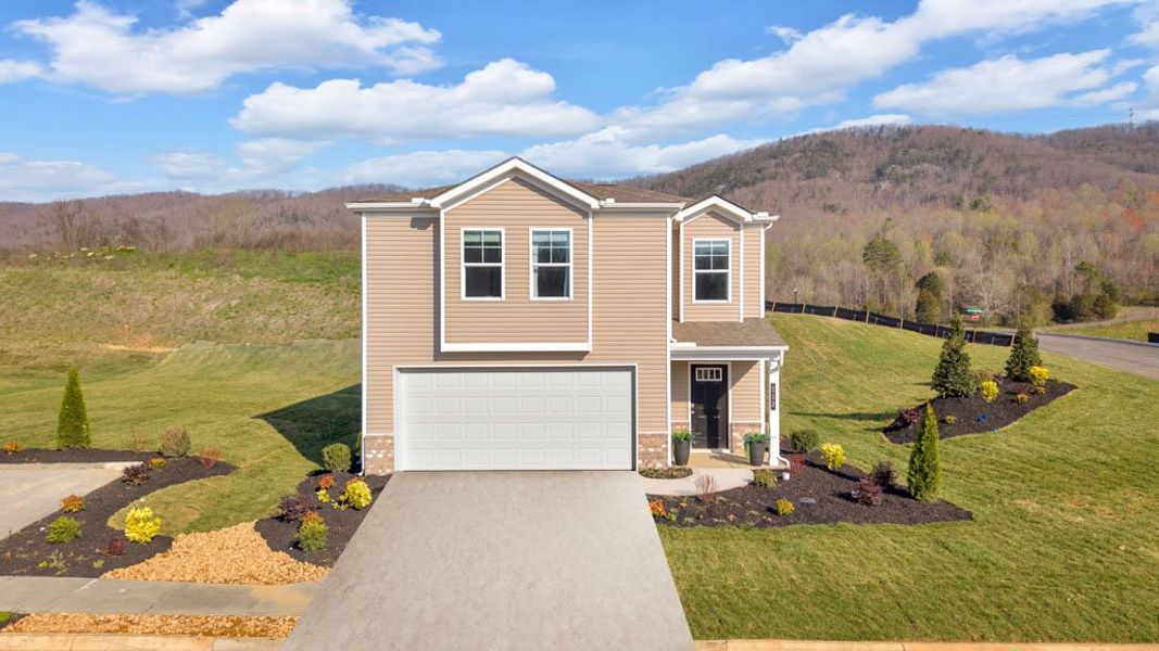 Front exterior of a new home in Emory Creek, Harriman, TN, highlighting curb appeal (Image 1). Front exterior of a new home in Emory Creek, Harriman, TN, highlighting curb appeal (Image 1).