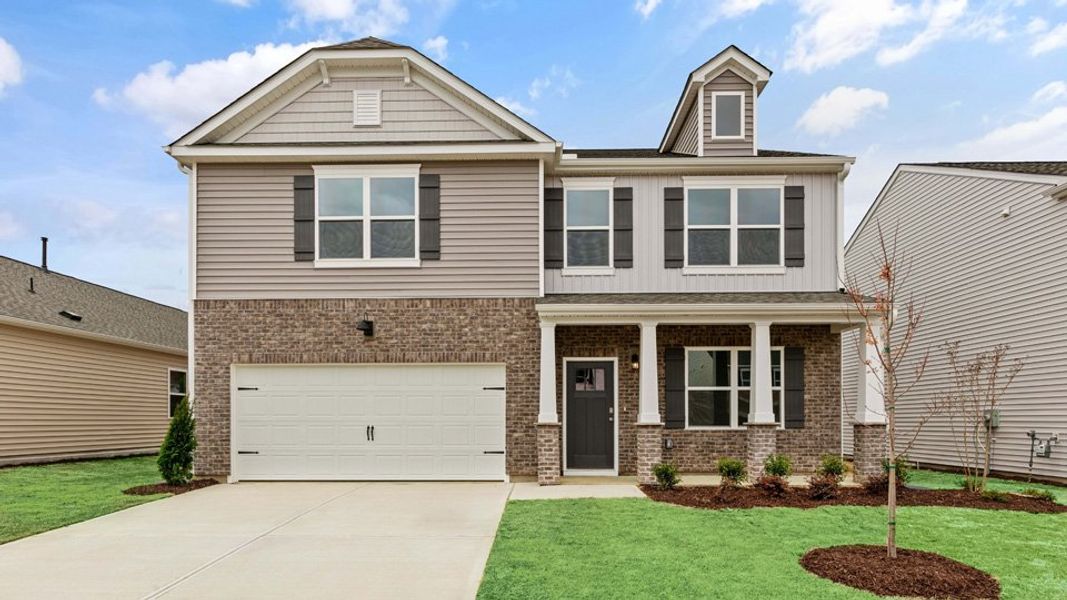 Front exterior of a new home in Galvins Ridge, Sanford, NC, highlighting curb appeal (Image 1). Front exterior of a new home in Galvins Ridge, Sanford, NC, highlighting curb appeal (Image 1).