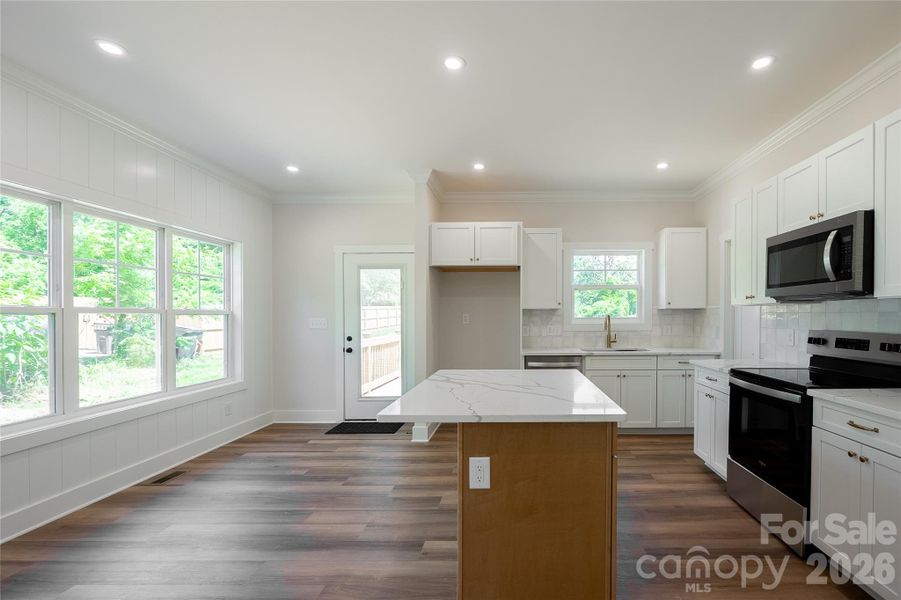 Furnished interior view inside a new home in , Huntersville (Image 6).