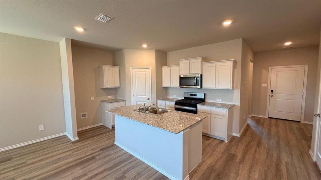 Kitchen - All Home and community information, including pricing, included features, terms, availability and amenities, are subject to change at any time without notice or obligation. All Drawings, pictures, photographs, video, square footages, floor plans, elevations, features, colors and sizes are approximate for illustration purposes only and will vary from the homes as built. Kitchen - All Home and community information, including pricing, included features, terms, availability and amenities, are subject to change at any time without notice or obligation. All Drawings, pictures, photographs, video, square footages, floor plans, elevations, features, colors and sizes are approximate for illustration purposes only and will vary from the homes as built.