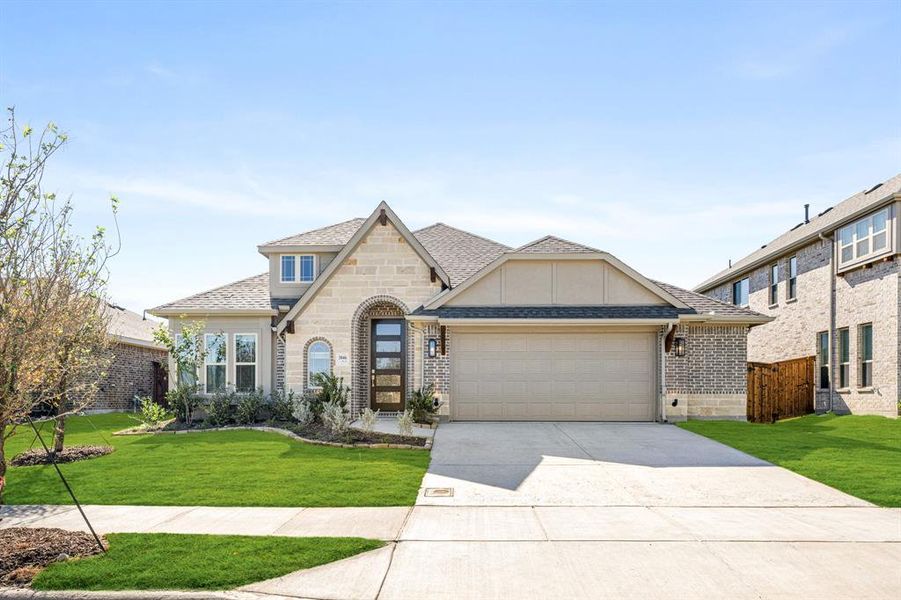 Front exterior of a new home in Waterscape Classic 60s, Royse City, TX, highlighting curb appeal (Image 2). Front exterior of a new home in Waterscape Classic 60s, Royse City, TX, highlighting curb appeal (Image 2).
