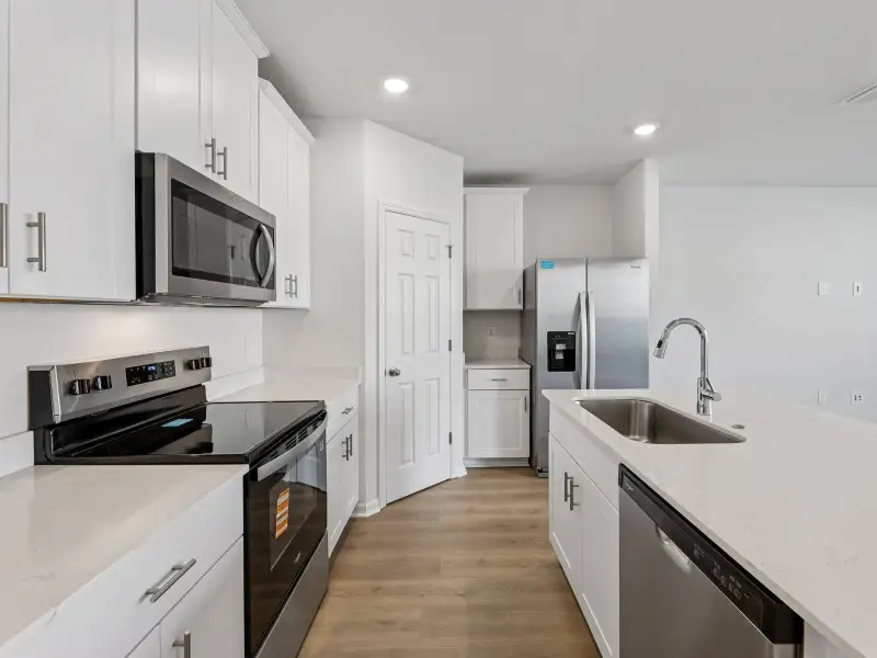 Furnished interior view inside a new home in Cagan Crossings West, Clermont (Image 3).