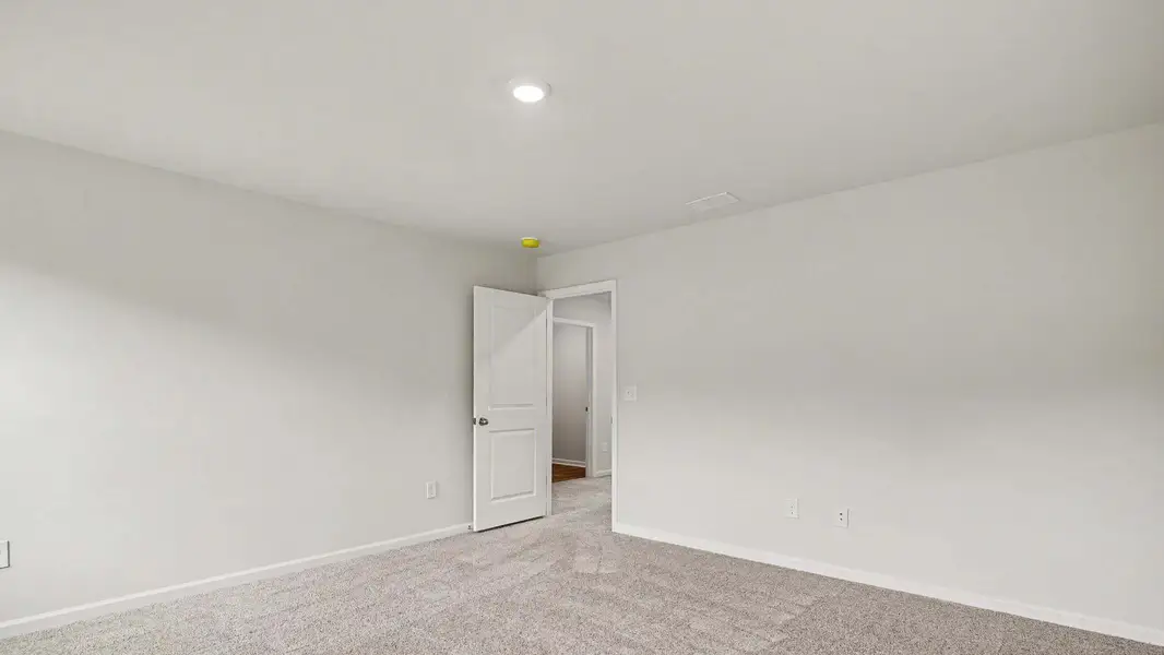 Representative unfurnished interior of a home built from the Arden by D.R. Horton in Sandridge Park, Little River (Image 13).