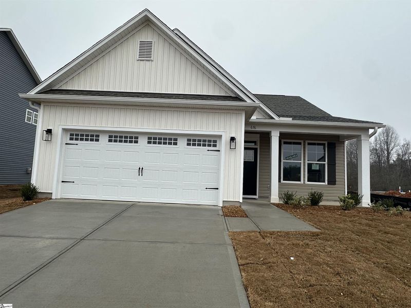 Front exterior of a new home in Shiloh Trail, Wellford, SC, highlighting curb appeal (Image 2).