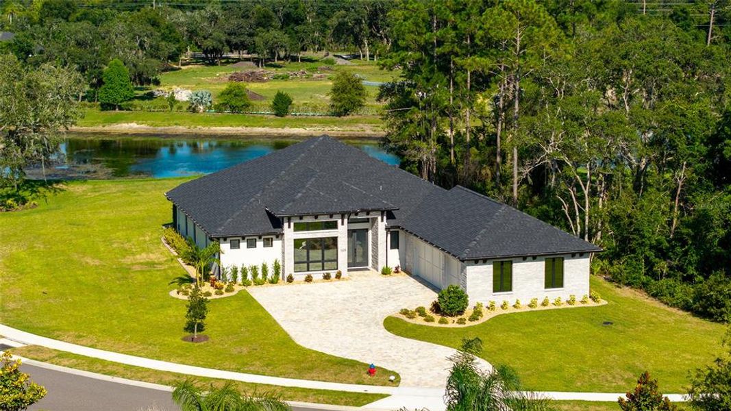 Front exterior of a new home in , New Smyrna Beach, FL, highlighting curb appeal (Image 29). Front exterior of a new home in , New Smyrna Beach, FL, highlighting curb appeal (Image 29).