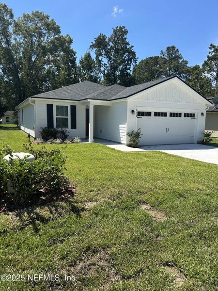 Front exterior of a new home in , Jacksonville, FL, highlighting curb appeal (Image 1). Front exterior of a new home in , Jacksonville, FL, highlighting curb appeal (Image 1).