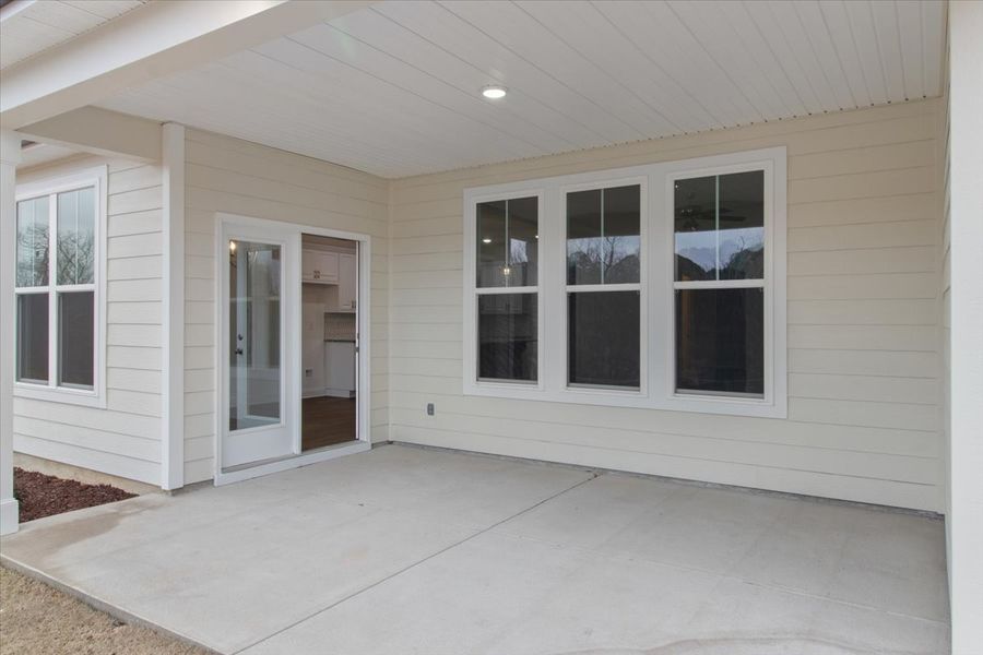 Backyard & Covered Patio | 915 Lillian Park Drive, The Nottaway Plan by Ivey Homes