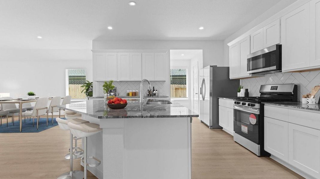 Furnished interior view inside a new home in Caldwell Crossing, Iowa Colony (Image 5).