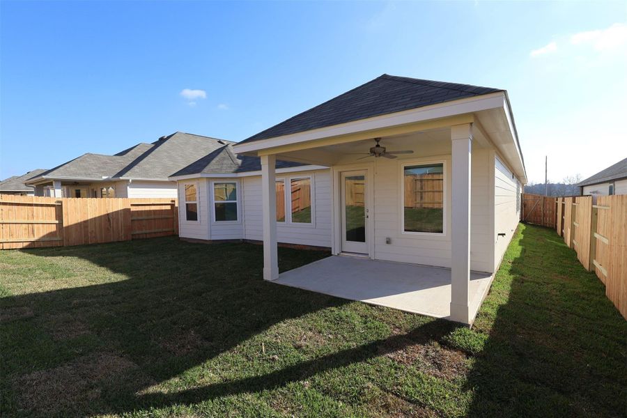Exterior details and patio area of a home in Lone Star Landing, Montgomery (Image 4).