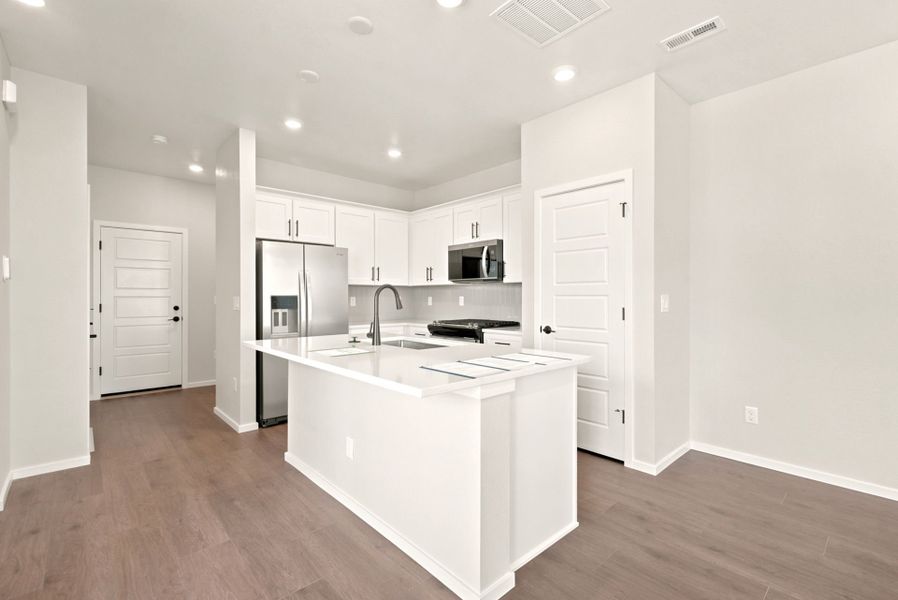 Furnished interior view inside a new home in Sky Ranch, Watkins (Image 14).
