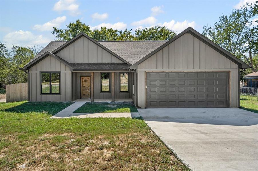 Front exterior of a new home in , Mineral Wells, TX, highlighting curb appeal (Image 1).