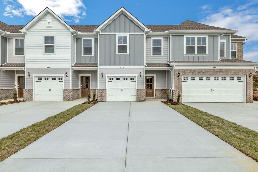 Front exterior of a new home in Cedar Grove Village, Smyrna, TN, highlighting curb appeal (Image 1). Front exterior of a new home in Cedar Grove Village, Smyrna, TN, highlighting curb appeal (Image 1).