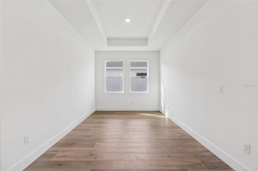 Spacious, unfurnished interior of a new home in North River Ranch - Cottage Series, Parrish (Image 12).