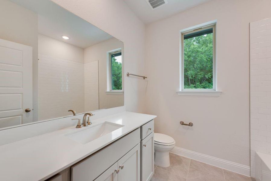 Furnished interior view inside a new home in Valencia On The Lake, Little Elm (Image 9).