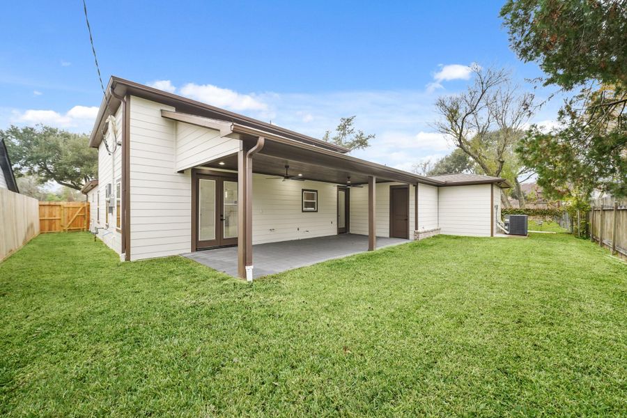 Exterior details and patio area of a home in , Houston (Image 27).