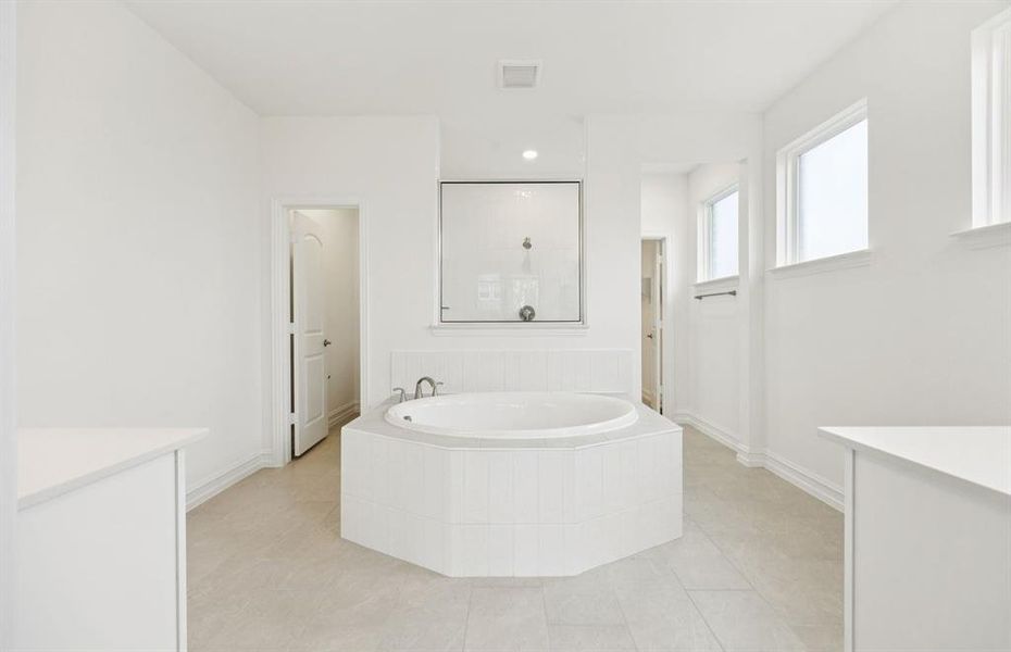 Modern owner's bathroom with spacious shower