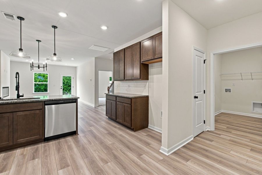 These pictures are of another unit of the same floor plan. Design selections will vary.