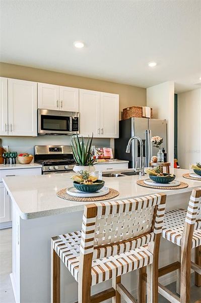 Furnished interior view inside a new home in Waterstone, Groveland (Image 11). Furnished interior view inside a new home in Waterstone, Groveland (Image 11).