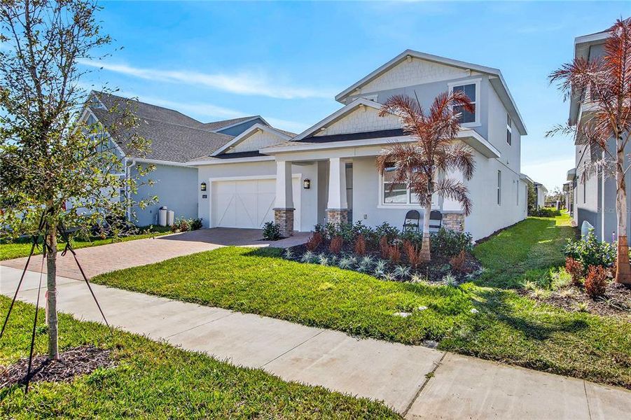 Front exterior of a new home in , Sanford, FL, highlighting curb appeal (Image 27).