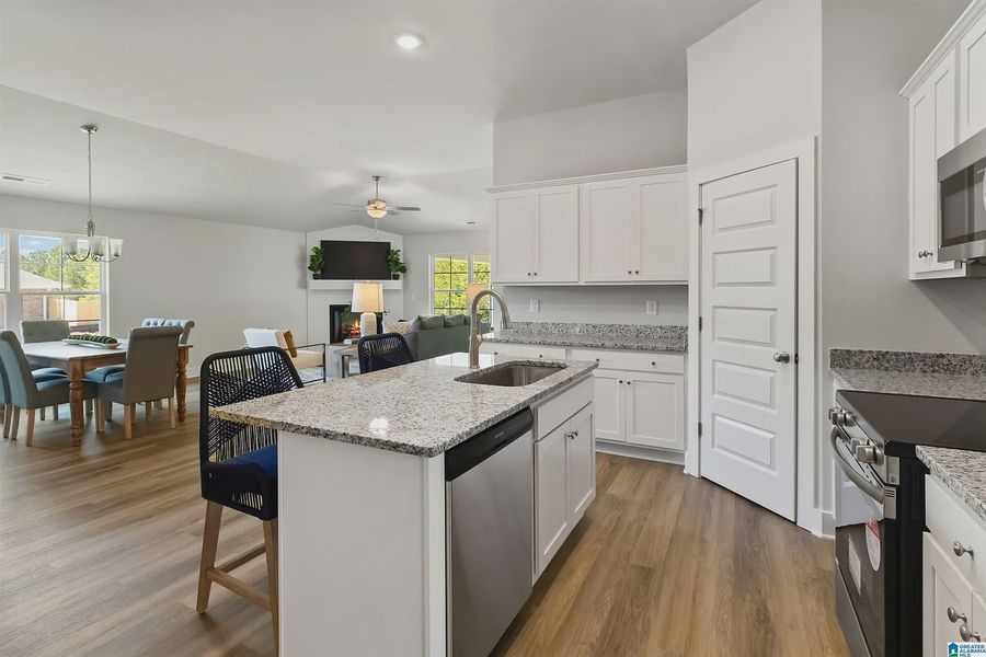 Representative furnished interior of a home built from the 1635-C by Adams Homes in Kirkland Farms, Alachua (Image 12).
