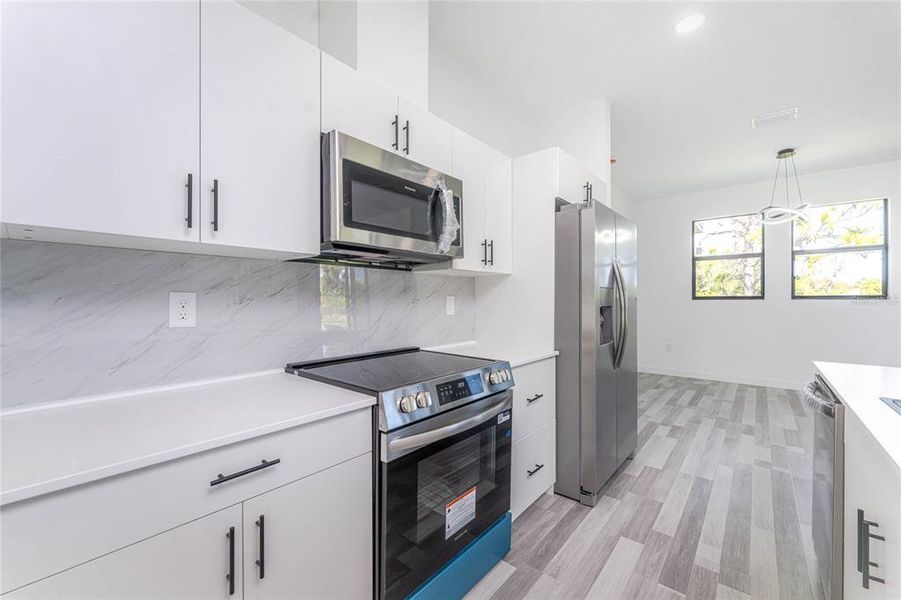 Furnished interior view inside a new home in , Port Charlotte (Image 20).