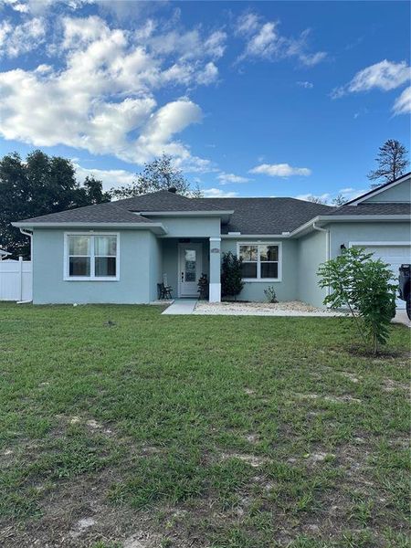 Front exterior of a new home in , Ocala, FL, highlighting curb appeal (Image 24).