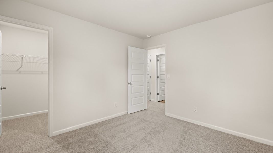 Representative unfurnished interior of a home built from the Darwin by D.R. Horton in Poplar Preserve, Newnan (Image 23).