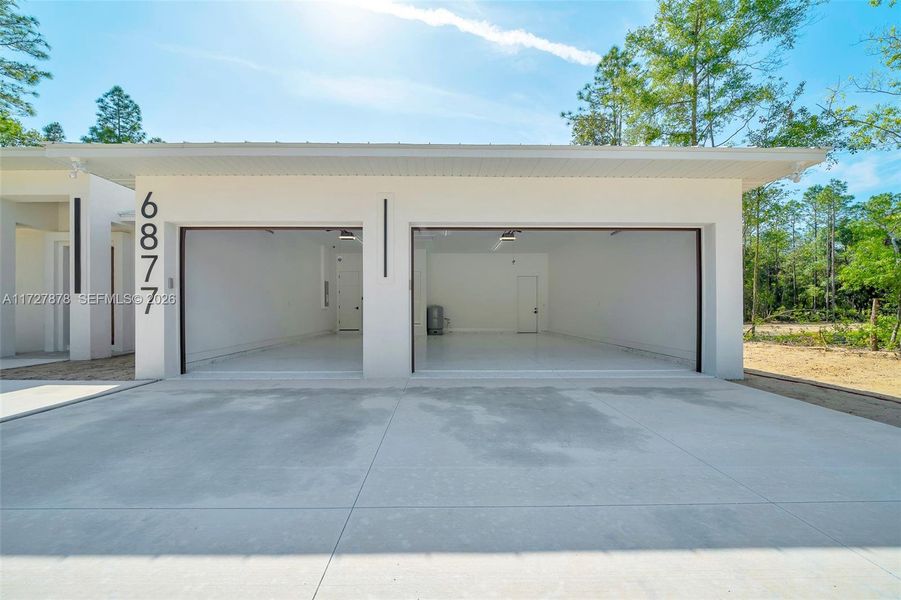 DRIVEWAY AND 3 CARS GARAGE DRIVEWAY AND 3 CARS GARAGE