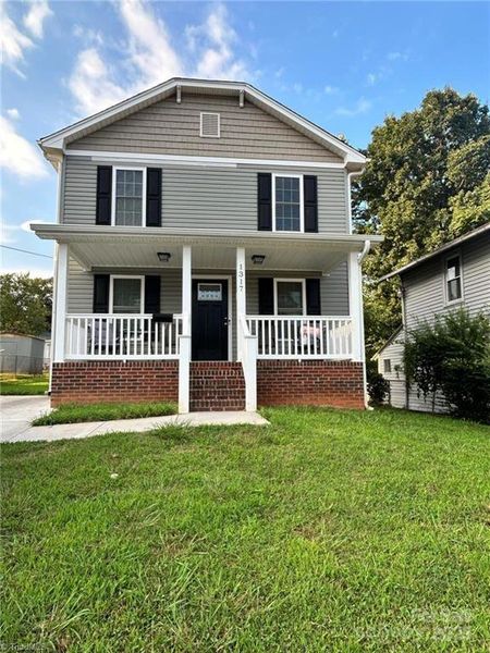 Front exterior of a new home in , Winston-Salem, NC, highlighting curb appeal (Image 1). Front exterior of a new home in , Winston-Salem, NC, highlighting curb appeal (Image 1).