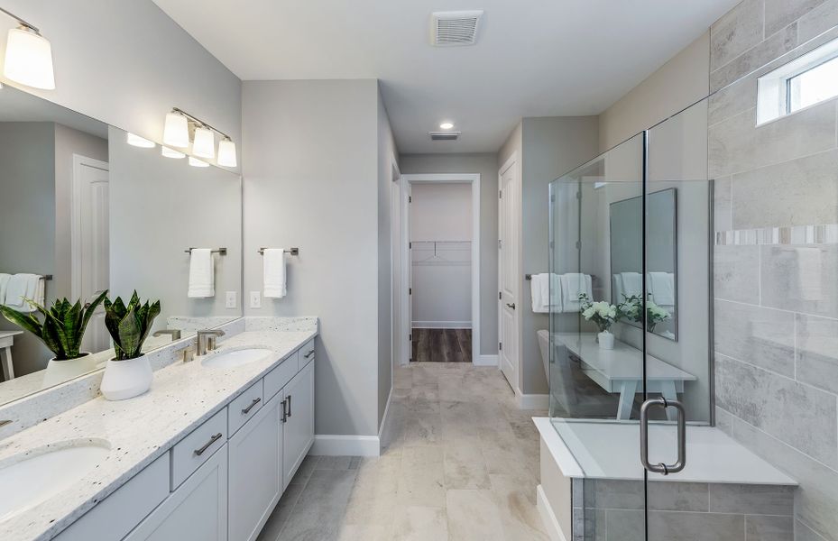 Owner's bath with dual-sink vanity and large shower Owner's bath with dual-sink vanity and large shower