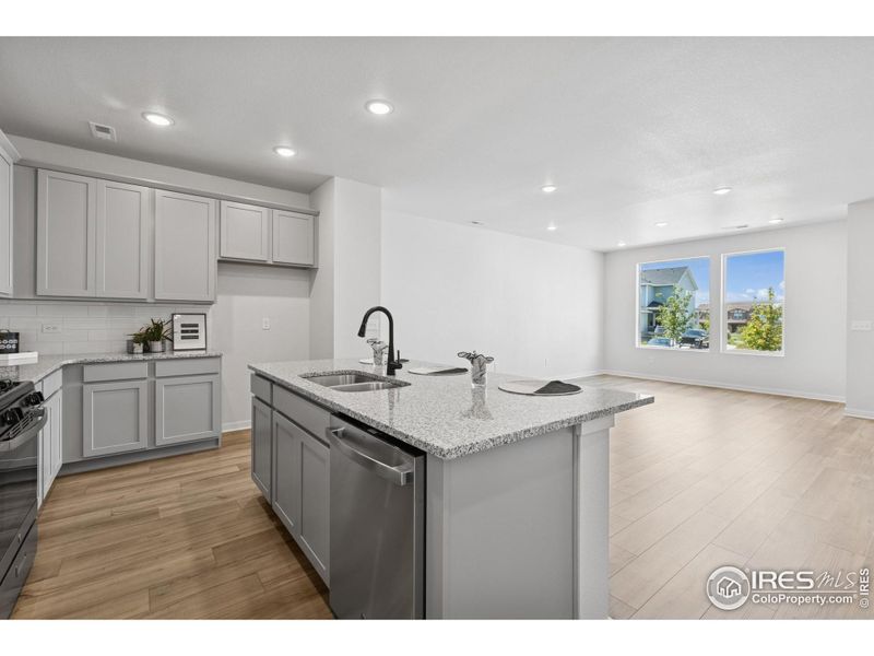 Furnished interior view inside a new home in Kinston Mainstreet Townhomes, Loveland (Image 13). Furnished interior view inside a new home in Kinston Mainstreet Townhomes, Loveland (Image 13).