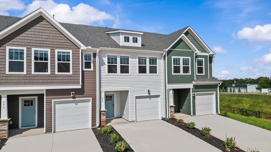 Front exterior of a new home in Saluda Crossing, Piedmont, SC, highlighting curb appeal (Image 20).